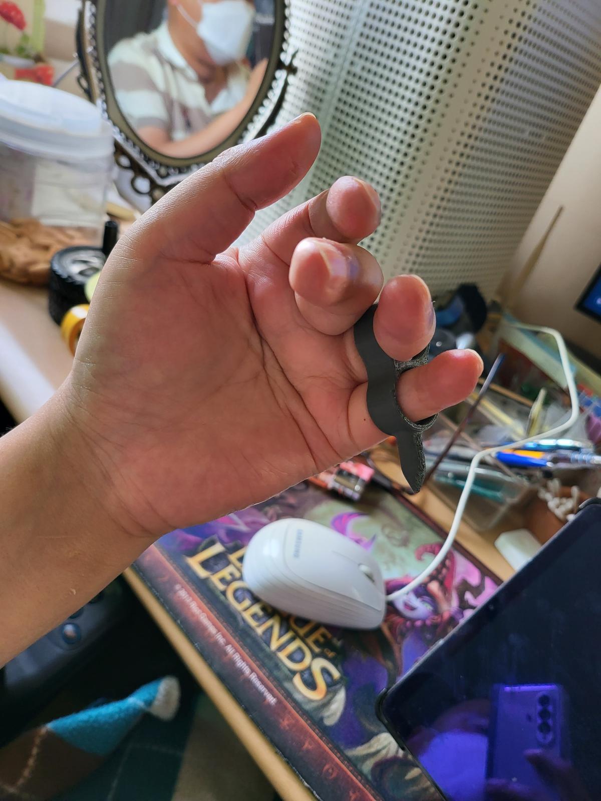 손가락 착용 타이핑 보조기기