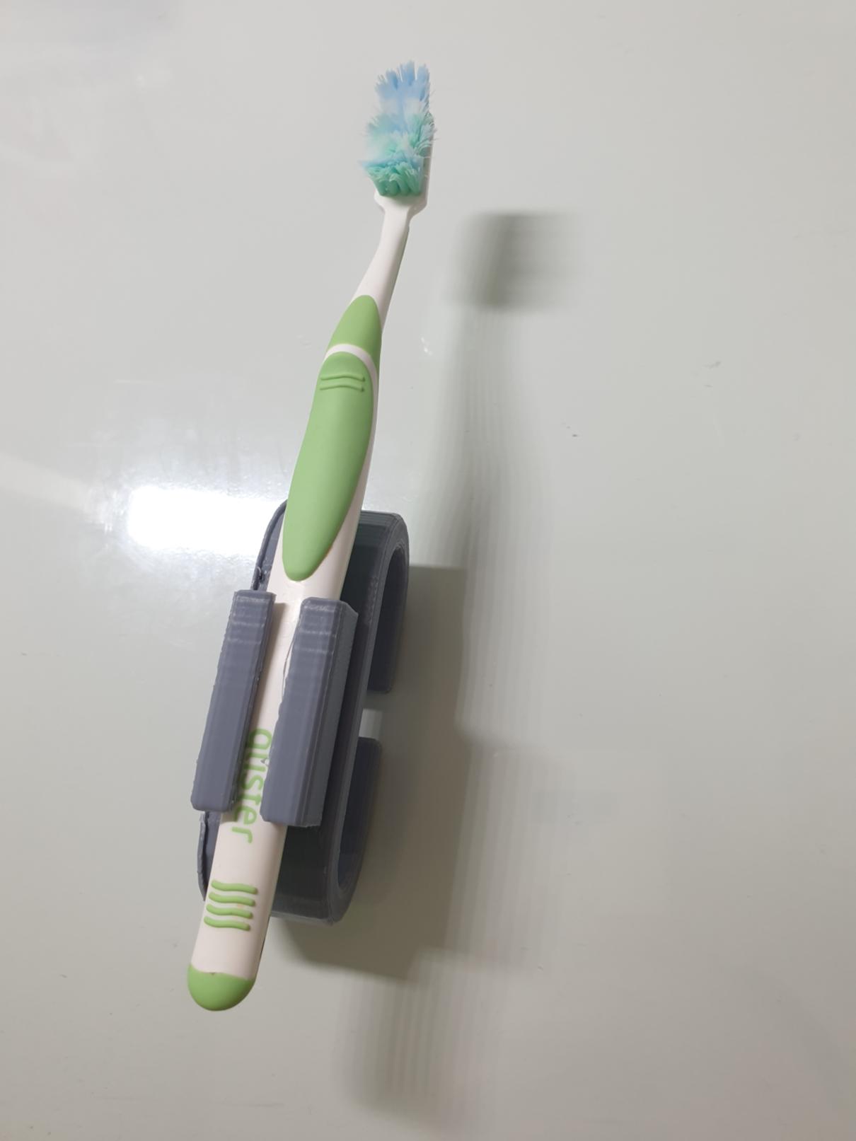 손가락 관절을 이용하지 않는 양치 보조기기