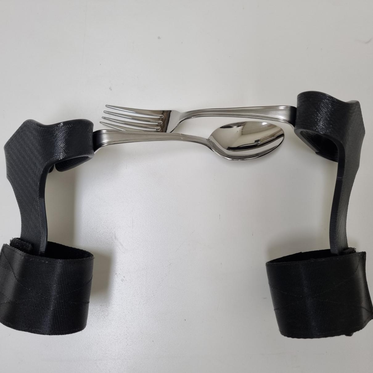 손목 고정형 식사 보조기기 